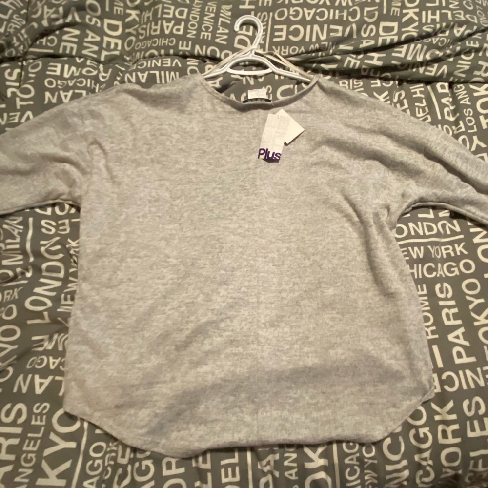 Woman’s 3/4 length sleeve. Grey NWT